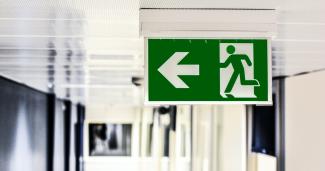 An exit sign in a modern office building